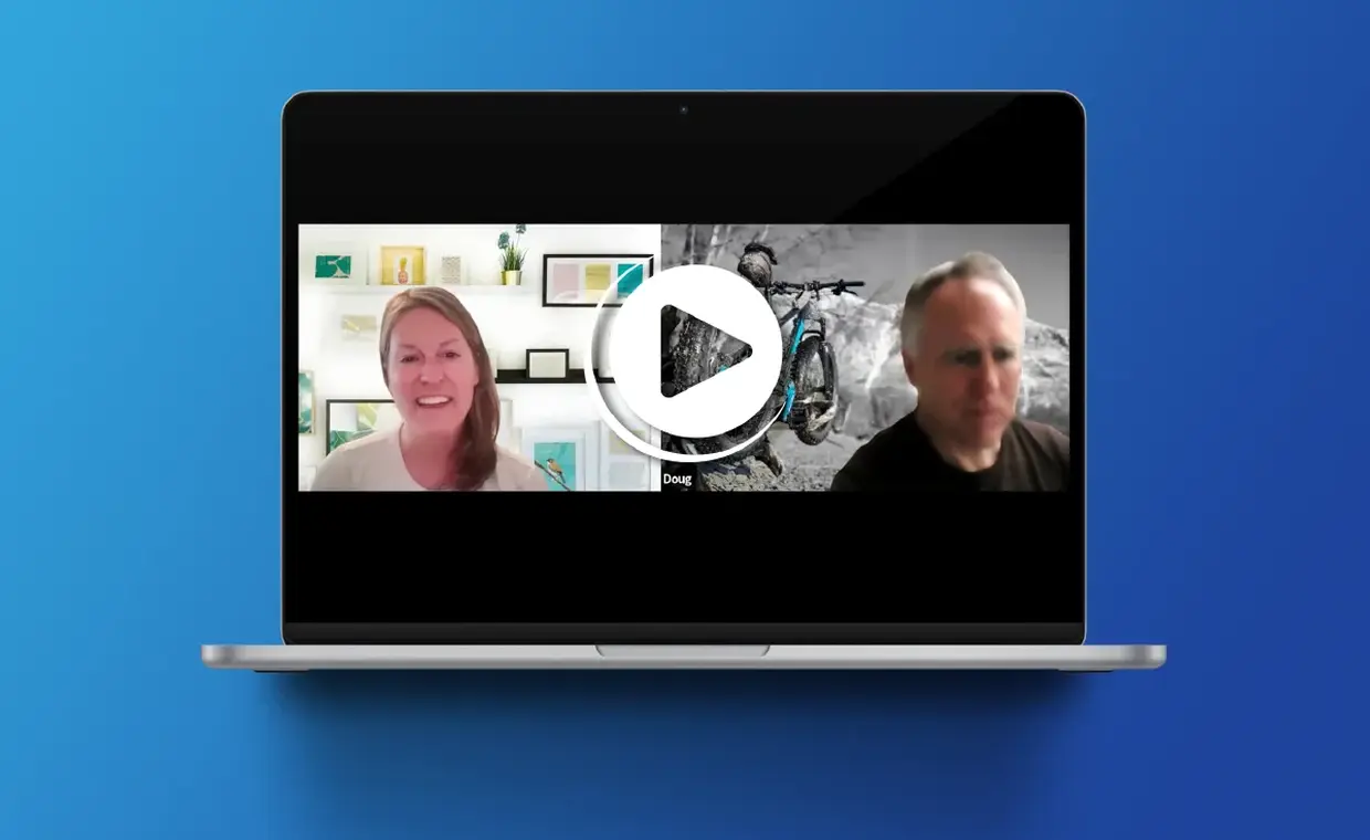 A laptop displays a video call with a smiling woman on the left and a man with a bicycle in the background on the right. A play button icon is overlaid in the center of the screen.