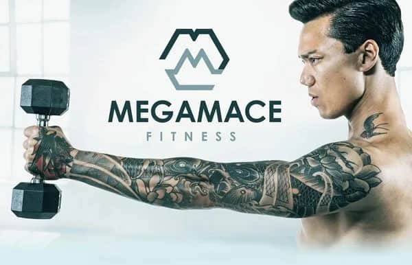 A muscular, tattooed man holds a dumbbell straight out in front of him. The logo and words MEGAMACE FITNESS are displayed in the background.