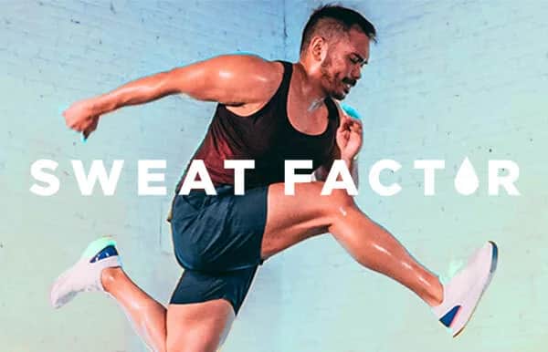 A muscular man in athletic clothes jumps energetically in a brightly lit gym. The words SWEAT FACTOR are displayed across the image with a droplet symbol replacing the O.