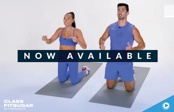 Two people in blue workout clothes kneel on exercise mats, smiling with thumbs up. A banner across the image reads NOW AVAILABLE. The lower corner shows the Class Fitsugar by Popsugar logo.
