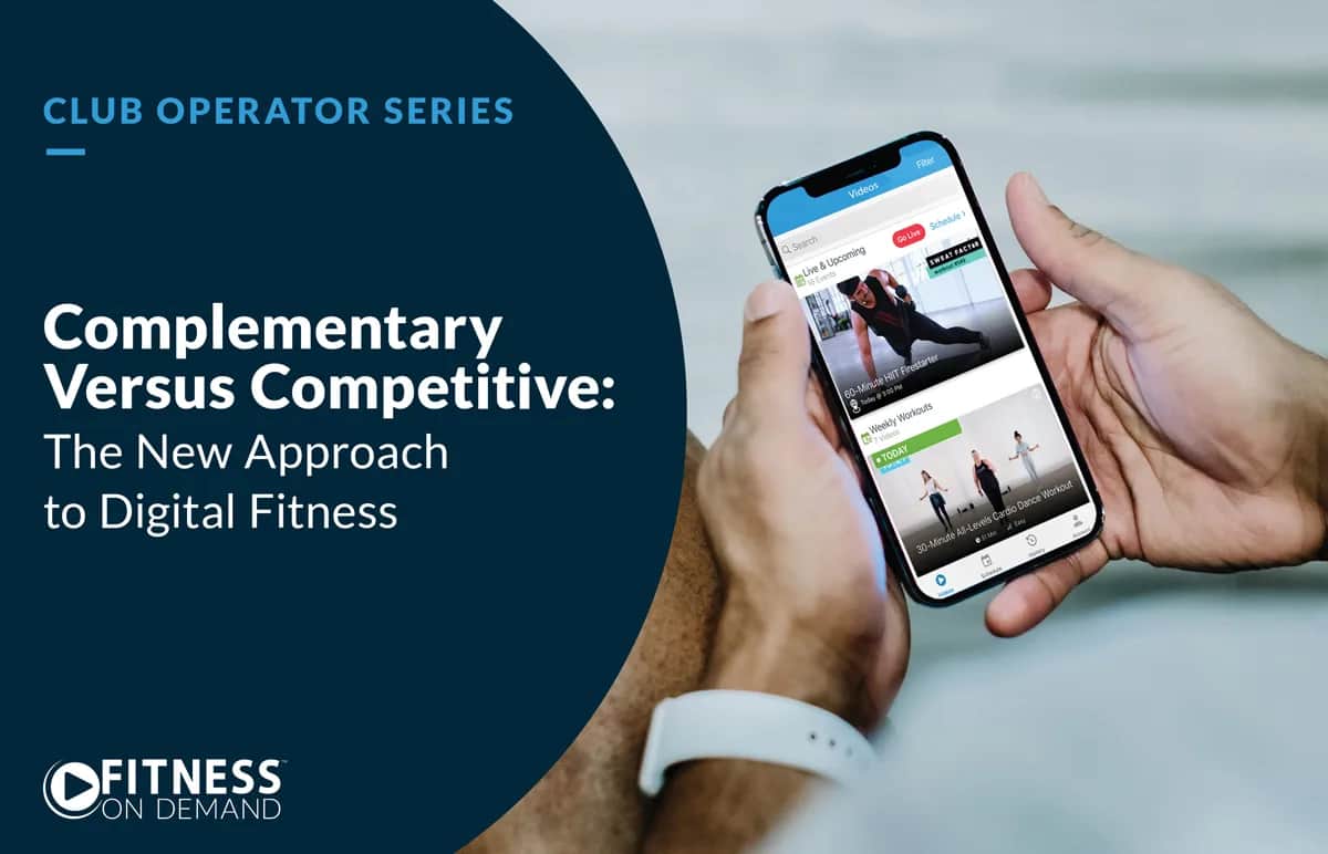 Close-up of a person holding a smartphone displaying a fitness app. Left side reads Complementary Versus Competitive: The New Approach to Digital Fitness with Fitness On Demand logo below.