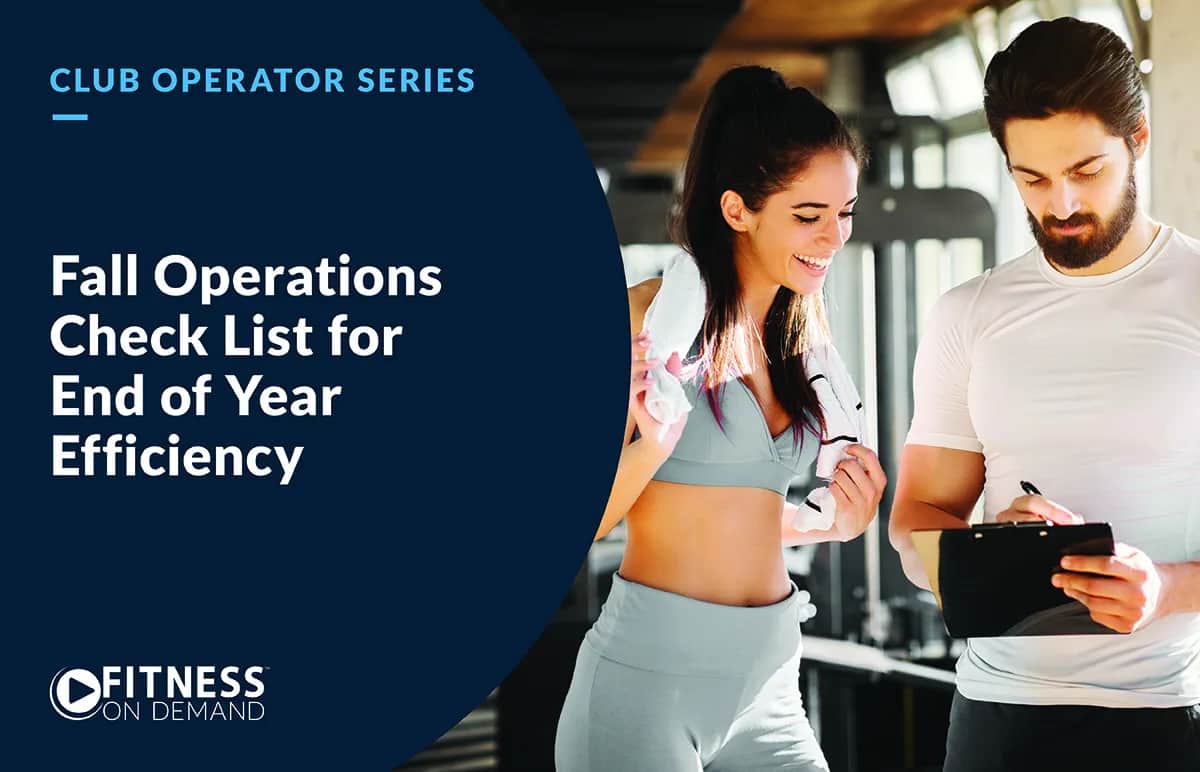 Two people in athletic wear stand in a gym. The woman is smiling and holding a towel, while the man writes on a clipboard. Text reads: Fall Operations Check List for End of Year Efficiency. FITNESS ON DEMAND.