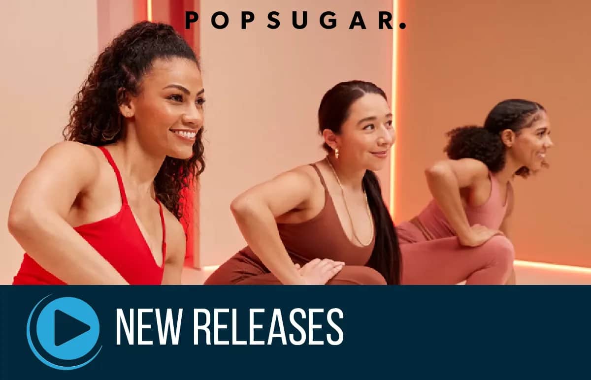 Three women in activewear perform a fitness routine together in a brightly lit studio. The text “POPSUGAR” appears above, and a blue banner with a play icon and “New Releases” is at the bottom of the image.