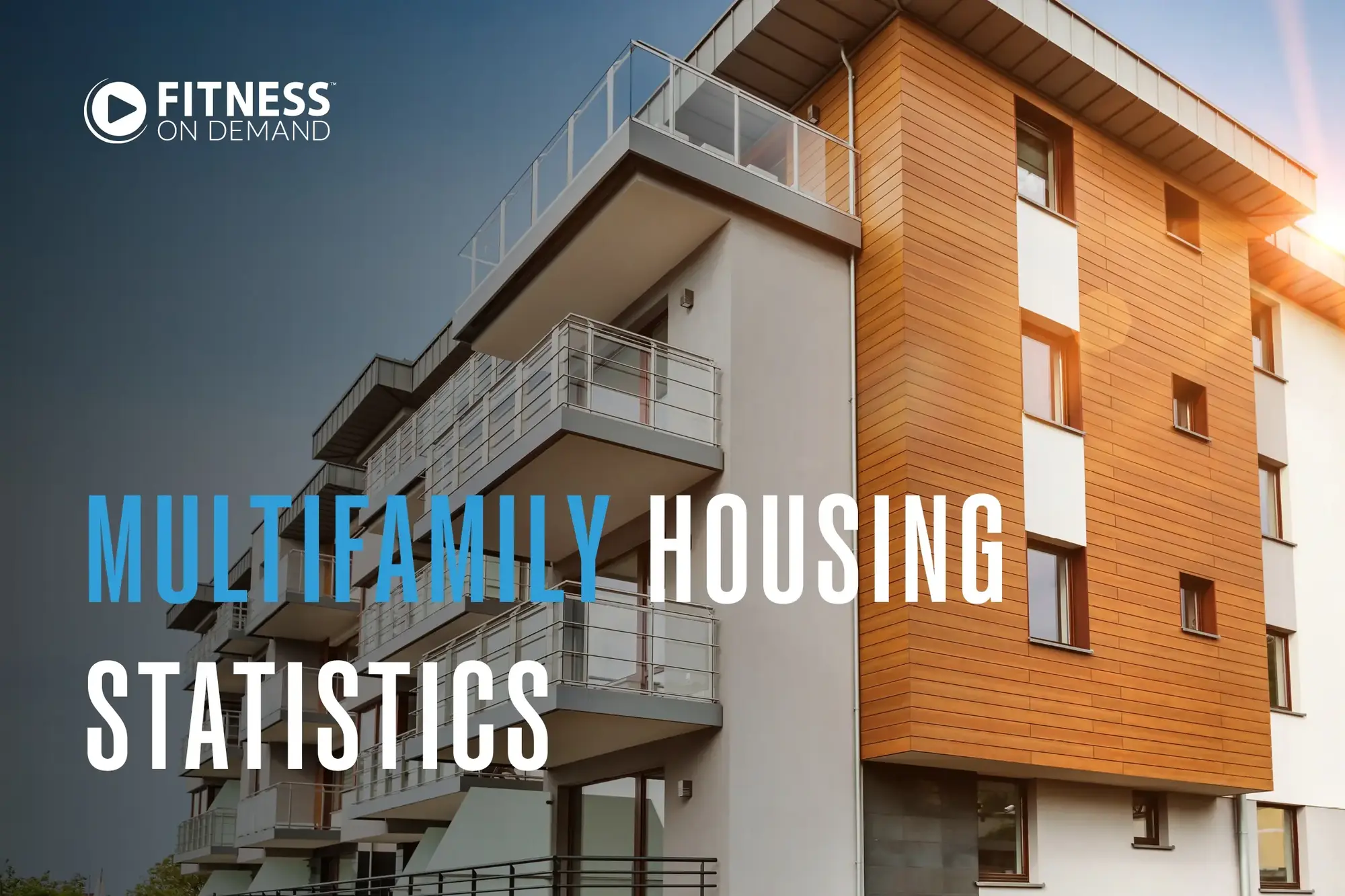 A modern multifamily apartment building with balconies and wood paneling is shown. The text reads: "Multifamily Housing Statistics."