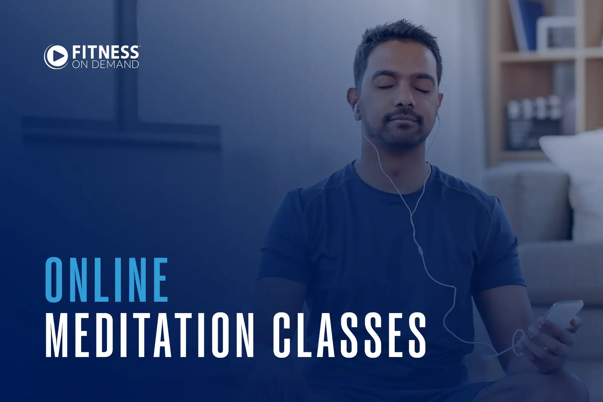 A man sits cross-legged with his eyes closed and earphones in, meditating. Text reads: Fitness On Demand. Online Meditation Classes.