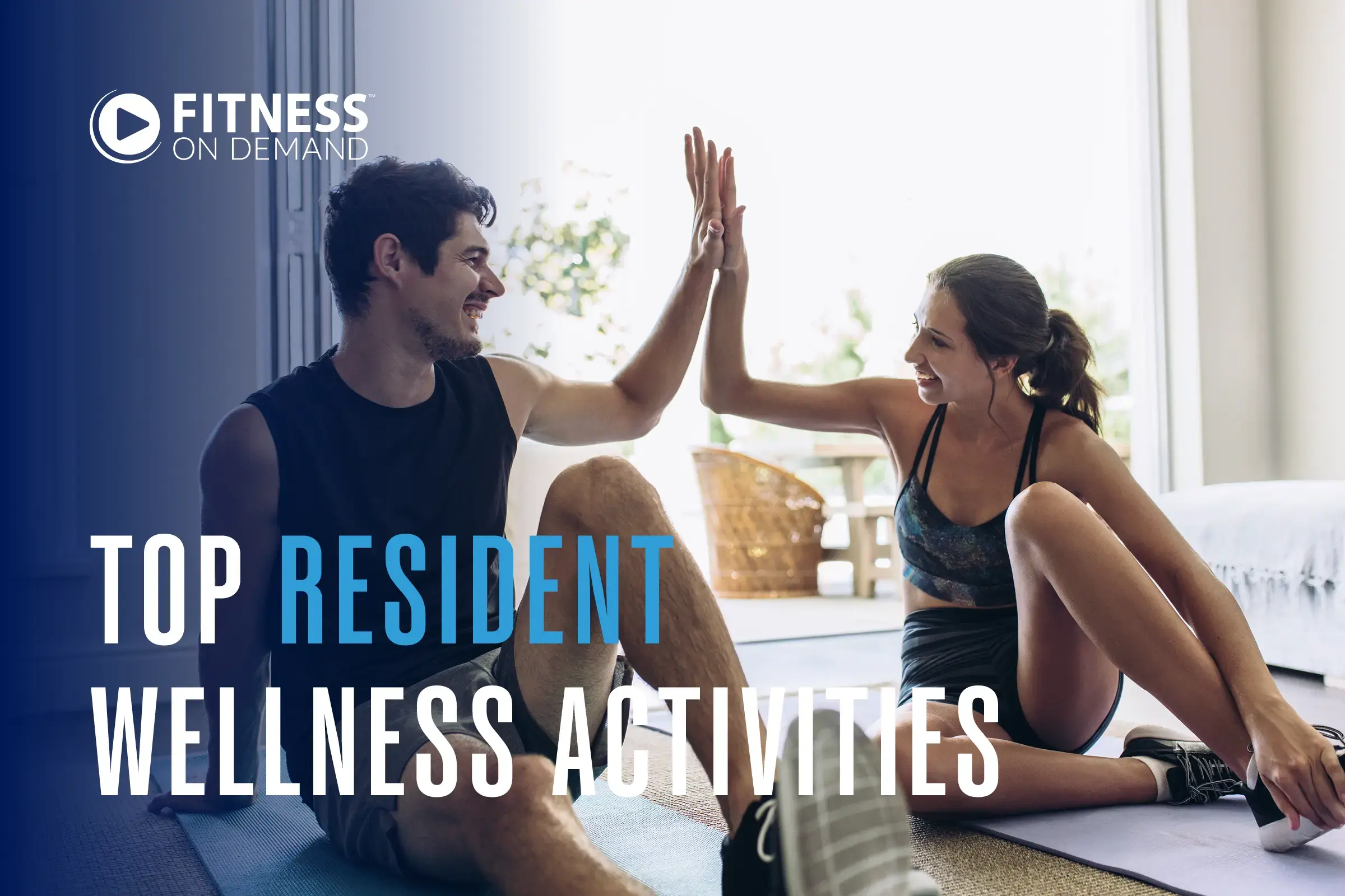 A man and woman in workout clothes sit on yoga mats indoors, smiling and high-fiving each other. Text says, Fitness On Demand: Top Resident Wellness Activities.